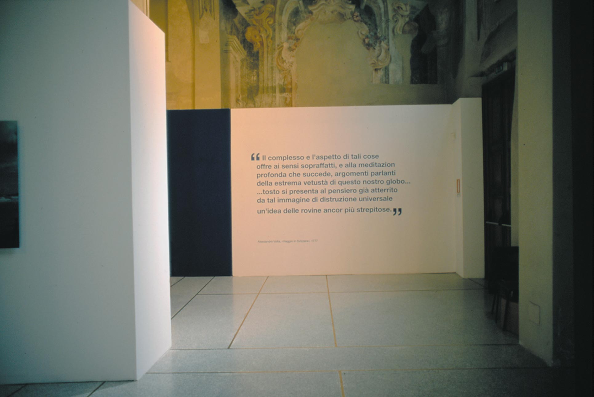 Exhibition view, San Pietro in Atrio Como, installation with wall painting and sentences from Alessandro Volta's diary 